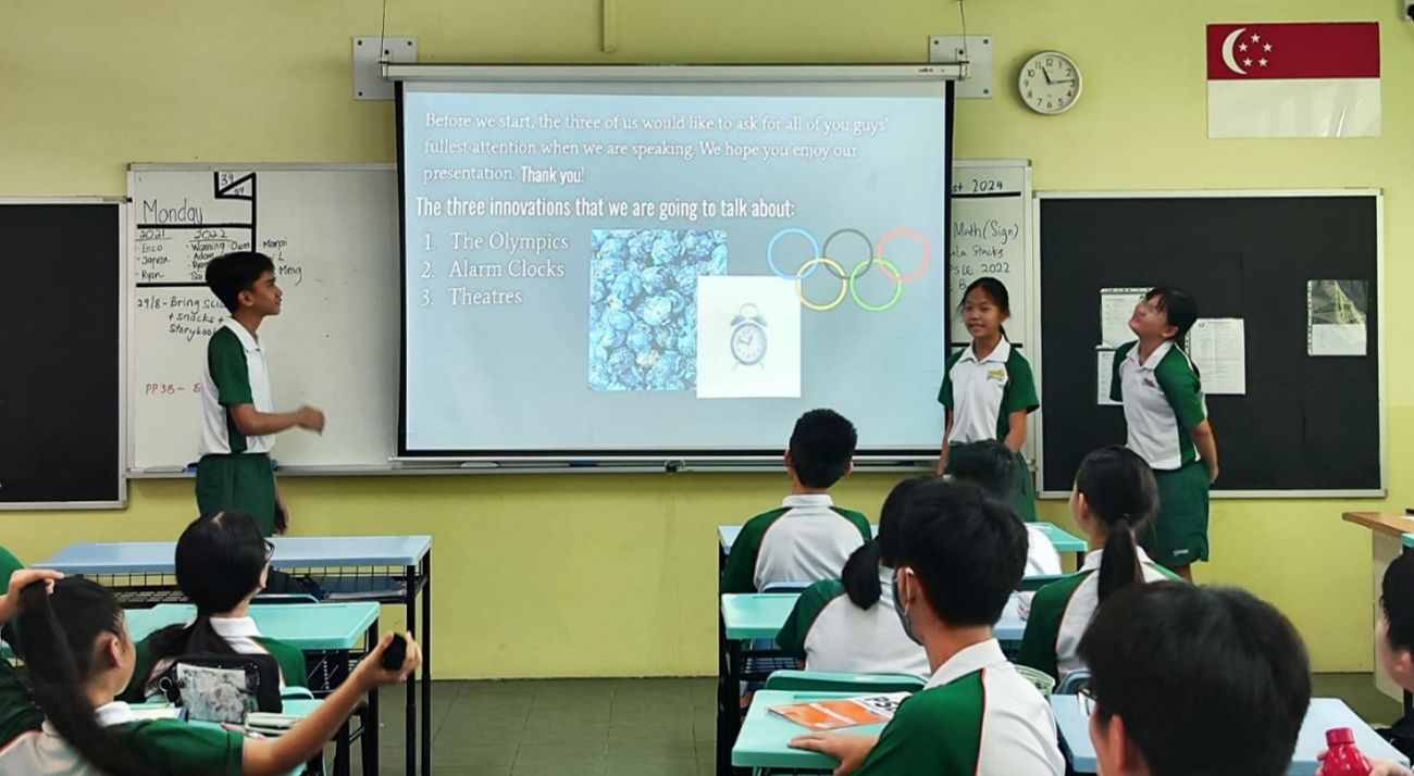 Students presenting their project to classmates.